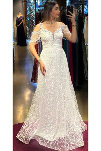 Abiyeniall Beyaz Düşük Kollu Boncuk İşlemeli   Kloş Etekli Simli Uzun Abiye E...