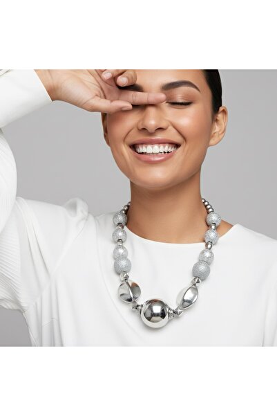 COCOSH TAKI Silver-colored chunky beaded choker necklace with shimmering bead...