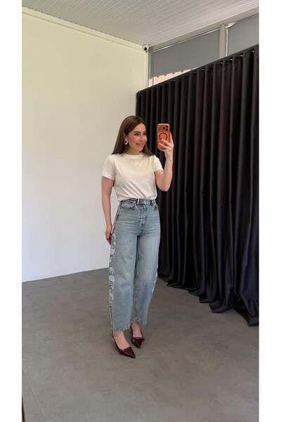 elif teke جينز موم أزرق مع تطريز أبيض على الجانبين