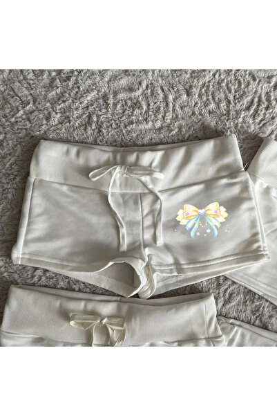 Gofeel شورت هاراجوكو صغير مطبوع عليه فراشة صفراء