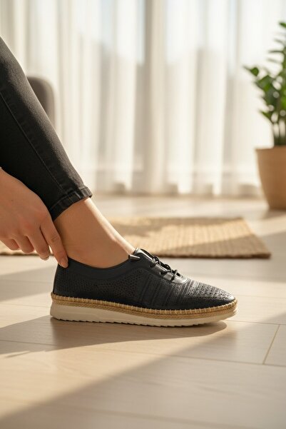 enoch أحذية مريحة لتقويم العظام مصنوعة من الجلد الطبيعي مع تفاصيل مثقوبة بالل...