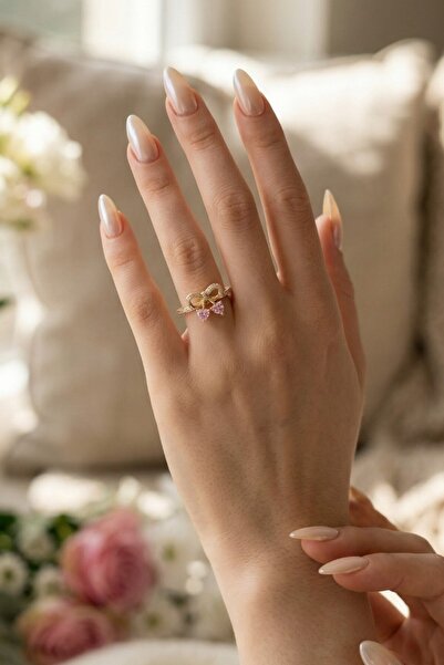 Alexis Carrel خاتم ذهبي قابل للتعديل مزين بحجر وردي نقي وتفاصيل فيونكة