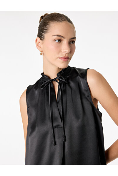 Koton Αμάνικη σατέν μπλούζα με βολάν και λεπτομέρεια δεσίματος