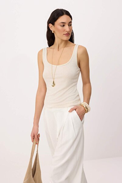 Trendyol Collection قميص داخلي منسوج من القطن بدون أكمام بياقة مستديرة ولون ب...