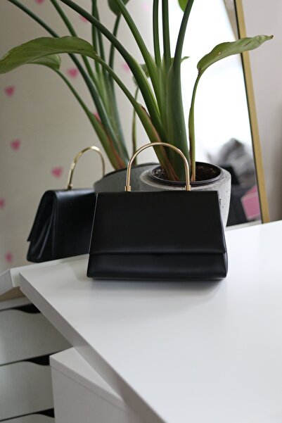 Moom Bag Geantă de mână și de umăr detaliată cu mâner metalic din piele neagr...