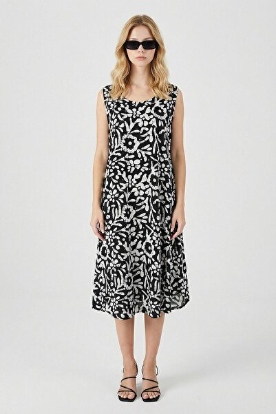 loia Γυναικεία ασπρόμαυρη αμάνικη φούστα με λαιμόκοψη U, ασύμμετρη κοπή, με σ...