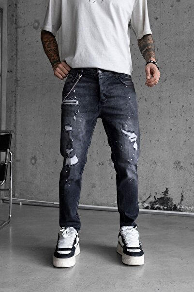 MODINI Slim fit jeans with chain, rips and splash effect (6711)