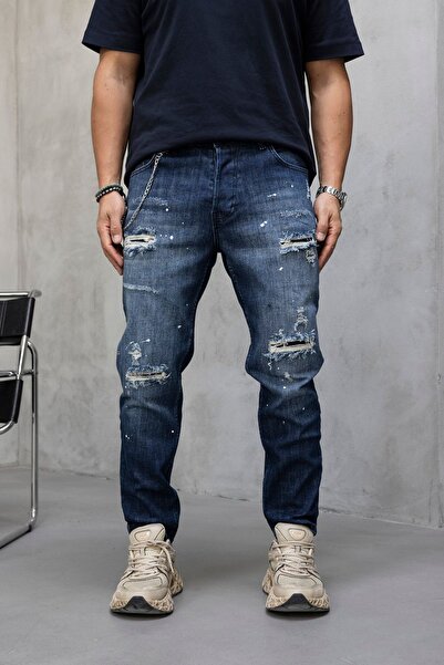MODINI Slim fit jeans with chain, rips and splash effect (6881)