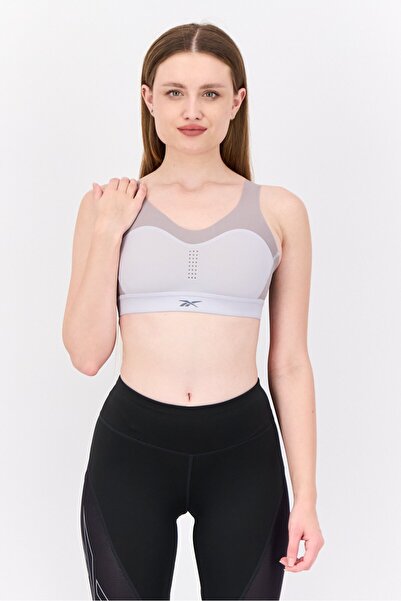 Reebok حمالة صدر رياضية مبطنة قليلاً بشعار العلامة التجارية للنساء، رمادي/أرج...