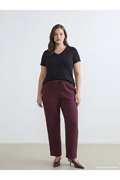 LC Waikiki Pantaloni de damă din muselină cu talie elastică și croială morcov...