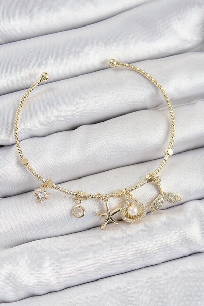 Inure Jewelry سوار من النحاس والزركون وحجر اللؤلؤ ونجم البحر موديل ذهبي اللون