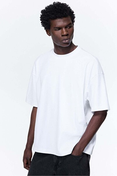 H&M تي شيرت بمقاس كبير