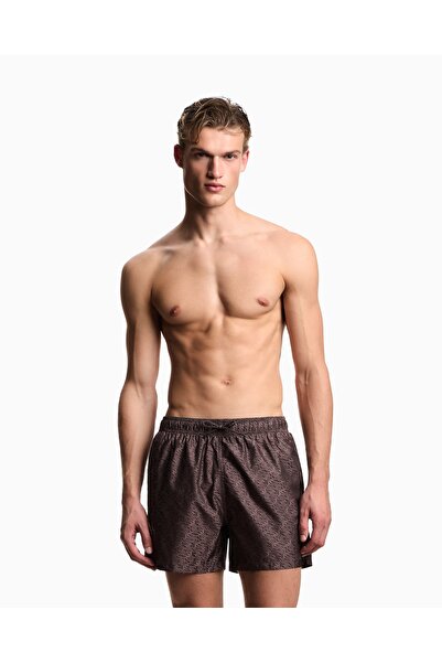 Emporio Armani ملابس سباحة رجالية سريعة الجفاف من القماش المزخرف بشعار ورباط ...