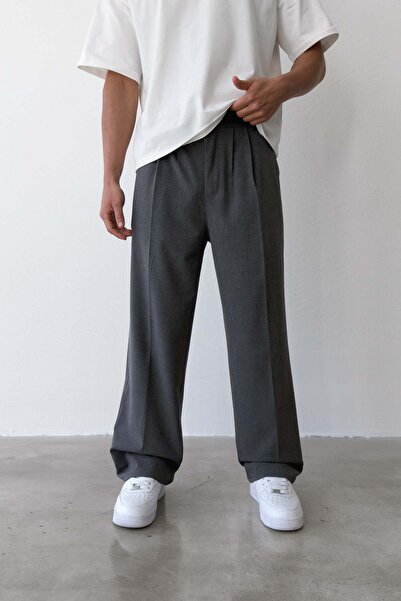 Flaw Wear بنطلون من القماش ذو تصميم فضفاض ومطوي باللون الرمادي الداكن