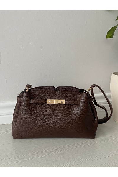 nura Καφέ δερμάτινη τσάντα ώμου με κλειδαριά