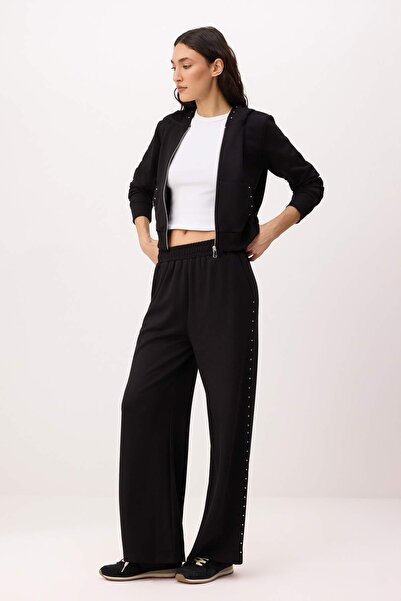 Trendyol Kollektion Schwarze, weit geschnittene, elastische Strick-Jogginghos...