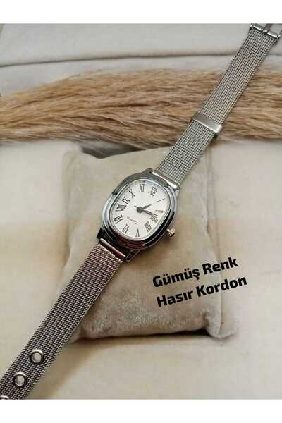 QUARTZ ساعة يد نسائية ذات تصميم بسيط باللون الفضي وحزام من الخوص - تصميم بأرق...