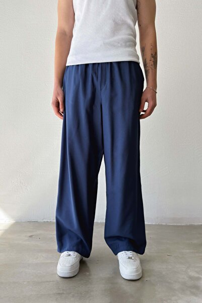 Flaw Wear بنطلون فضفاض بخصر مطاطي وقصة مريحة باللون الأزرق