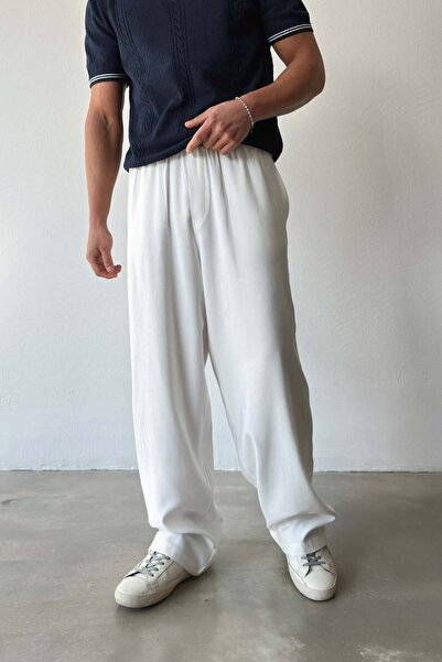 Flaw Wear بنطلون فضفاض بخصر مطاطي وقصة مريحة باللون الأبيض