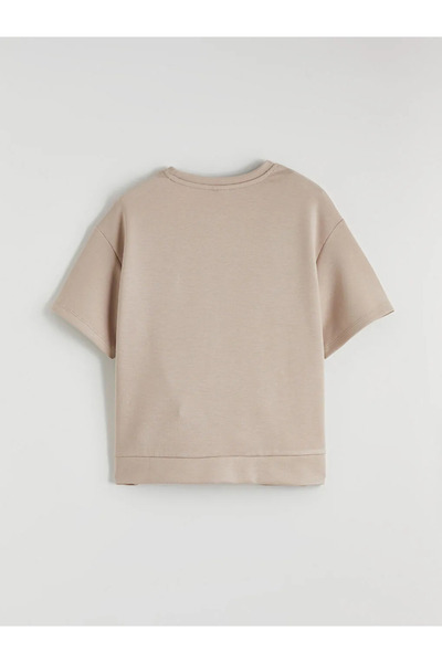 LC Waikiki Εκρού μπλουζάκι για κορίτσια και καμπάνα κολάν