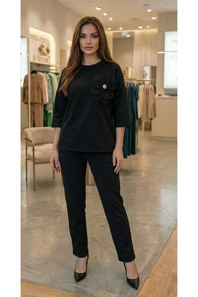 Volupta Elegant black suit with 3D floral detail