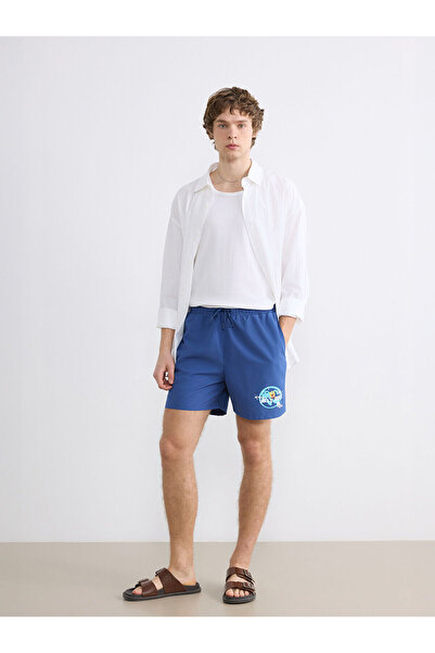 LC Waikiki شورت سباحة رجالي مطبوع عليه سبونج بوب من Özmarka للموسم الجديد