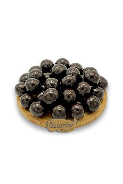 Özcanlar Kuruyemiş دراجيه بالشوكولاتة الداكنة والبندق 500 جرام