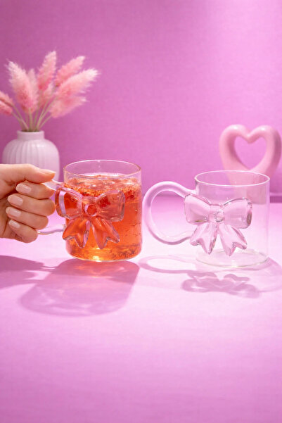 YzHome كوب زجاجي بفيونكة وردية اللون مع مقبض لمشروبات الشاي والقهوة سعة 350 مل