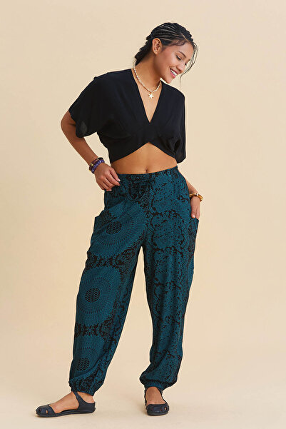 Los banditos Pantaloni drapați în stil boem cu picioare elastice