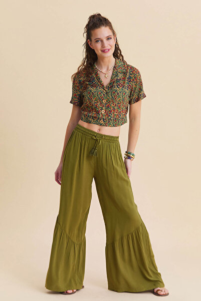 Los banditos Pantaloni cu talie cu șireturi, buzunare cu volane și picior larg