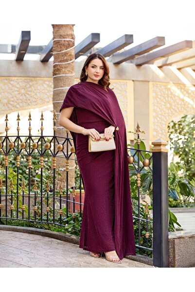 Opera Fashion A long evening dress with a luxurious cape design