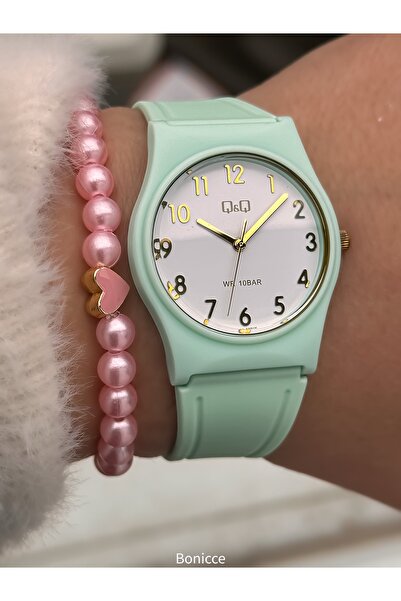 Q&Q ساعة يد للفتيات من السيليكون الأخضر النيلي مناسبة للاستخدام في حمام السبا...