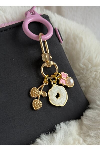 WhimsyWhite سلسلة مفاتيح مينيمال موديل إنسي كيريز - حقيبة ذهبية بتصميم مميز، ...