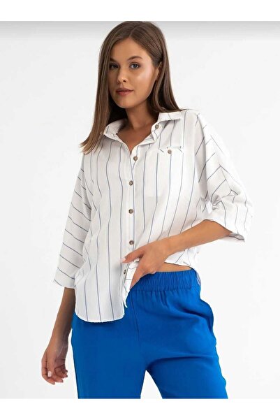 IŞILDA FASHION Φαρδύ πουκάμισο με μπλε ρίγες στο φως του ηλίου