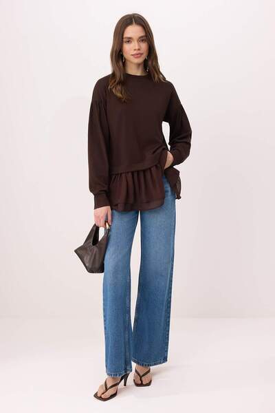 Trendyol Modest تنورة بنية اللون كبيرة الحجم من نوع إنترلوك محبوكة بحواف مكشك...