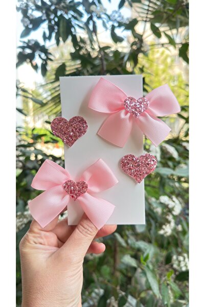 Toka Perisi Σετ μεταλλικών κλιπς με φιόγκο και κορδέλα σε ροζ χρώμα με γκλίτε...