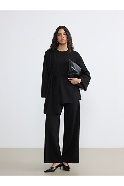 LC Waikiki بنطال رياضي نسائي أسود اللون بخصر مطاطي ناعم الملمس من GULIS GİYİM