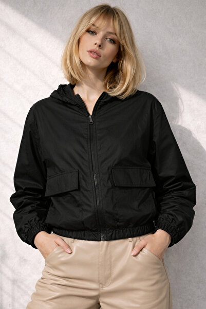 Gizrain Γυναικείο μαύρο αδιάβροχο αντιανεμικό υφασμάτινο αδιάβροχο με κουκούλ...