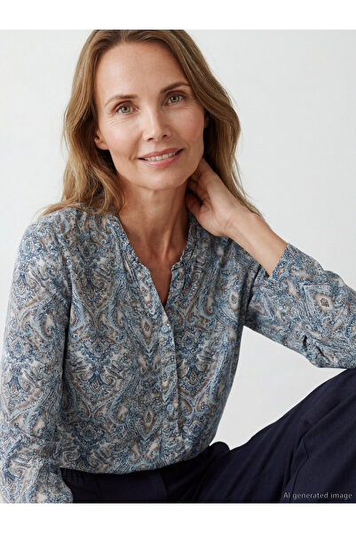 LC Waikiki Floral blouse with an asymmetrical neckline.