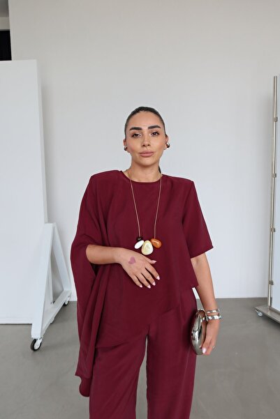 Özge Özgenç Asimetrična modalna bluza sa krojem