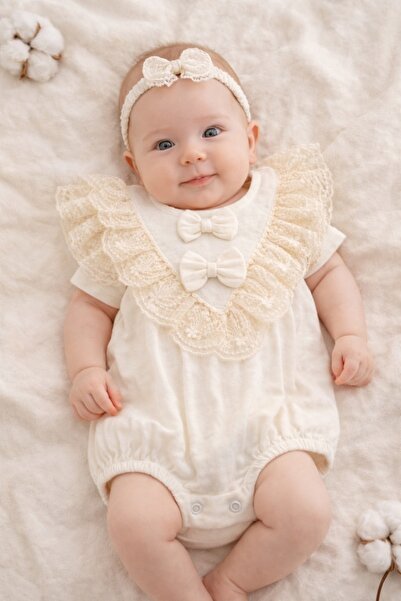 Pure Boutique Βρεφικό κοριτσίστικο ολόσωμο φορμάκι, από κομψή ιβουάρ μουσλίνα...