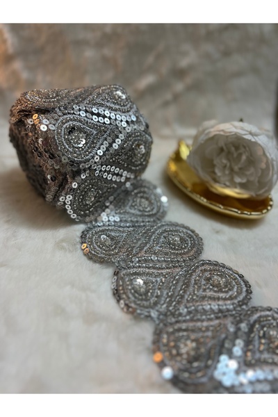 Yarn World The cost of luxury metallic stitching