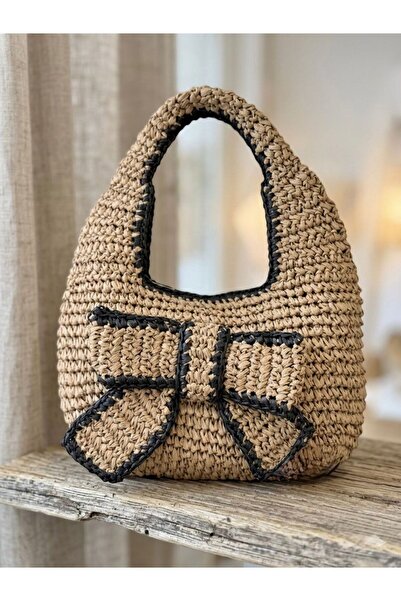 Axesoire NWC-1086 Ψάθινη τσάντα με φιόγκο σε χρώμα καμηλό και λεπτομέρειες χε...