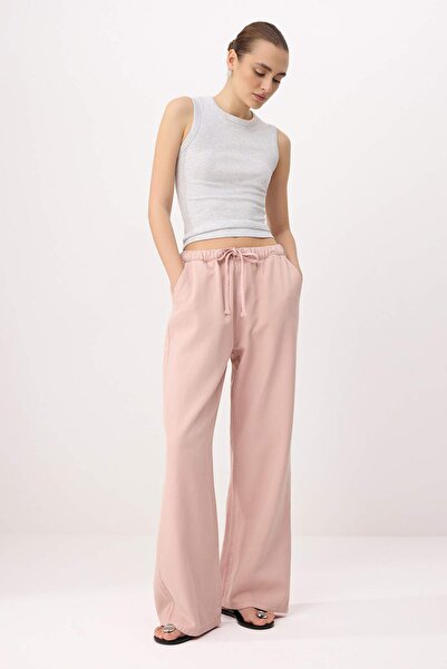 Trendyol Collection Blugi roz deschis cu talie înaltă și croială largă, amest...