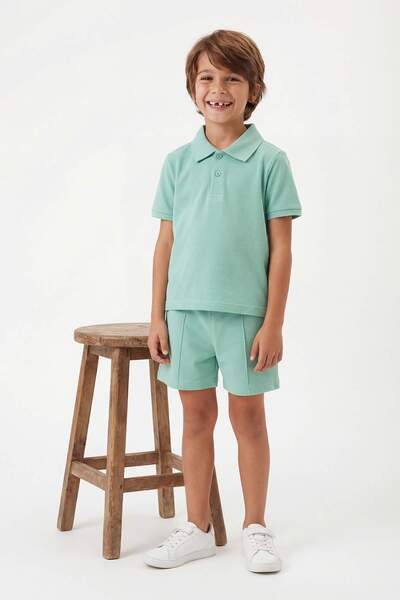 TRENDYOLKIDS Πράσινο αγορίστικο πλεκτό εορταστικό σετ μπλούζας και παντελονιο...