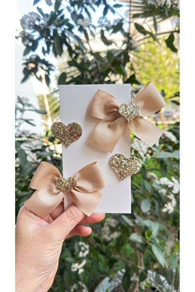 Toka Perisi Σετ μεταλλικών κλιπς με φιόγκο και κορδέλα σε χρυσό χρώμα με γκλί...