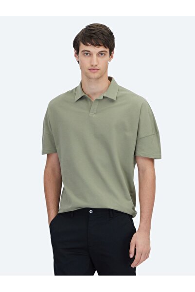 Kip تي شيرت بياقة بولو باللون الأخضر مصنوع من القطن بنسبة 100%