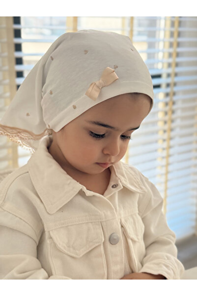 Nur Baby قبعة تدريب للفتيات بفيونكة منقوشة على شكل قلب باللون البيج من سيبيان