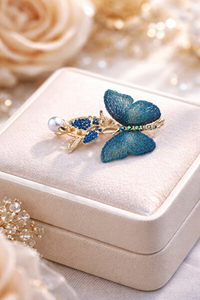 Store Mavi kelebek temalı broş