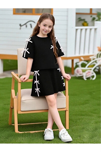 trendypassion Set 2 piese pentru copii: tricou cu fundă albă și fustă – Combi...